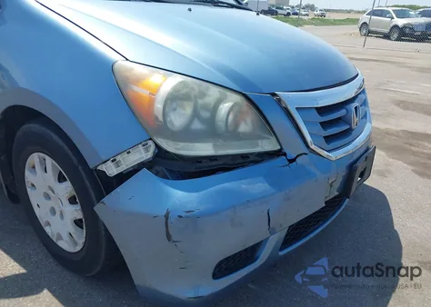 2009 Honda Odyssey Lx z USA, uszkodzony, nr VIN 5FNRL38299B056720